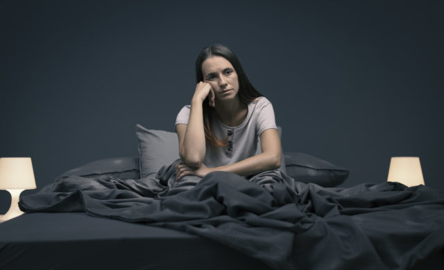Stressed woman suffering from insomnia