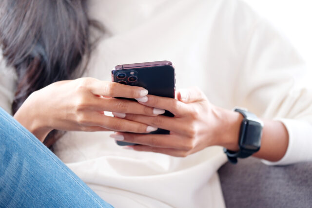 Close up of woman hand using mobile phone, People on smartphone, technology lifestyle, e commerce, online business, e learning, education, internet of things concept